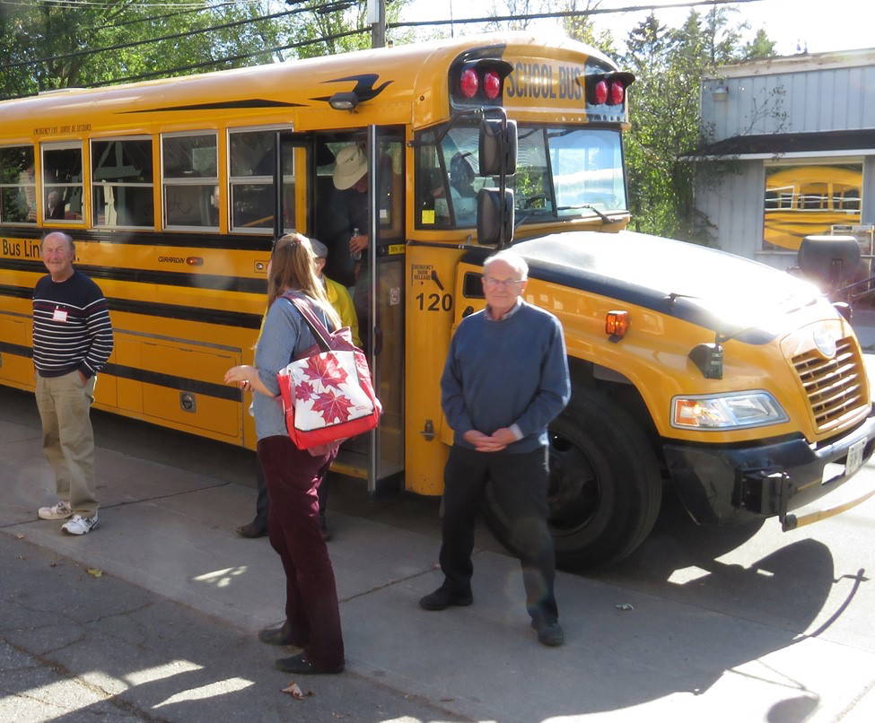 The bus tour of part of Rideau disembarks at the Rideau Archives in North Gower