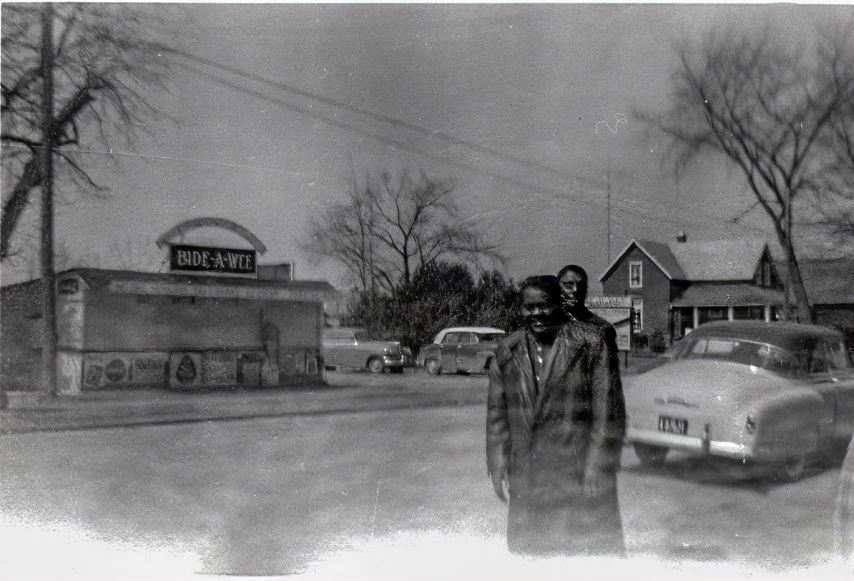 Antoine ‘Fats’ Domino and band/crew member on Main Street, North Gower near Bide-A-Wee, April 1957. – Rideau Archives, Elsie Hyland collection. Photographer: Elsie Hyland
